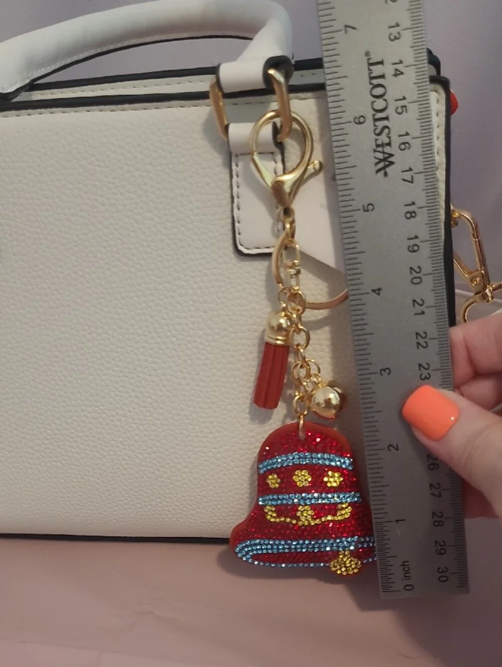 Stylish Red Bell Tassel Keychain with Gold Hardware